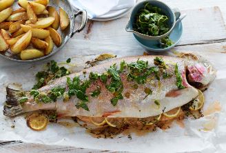 Whole baked ocean trout with kitchen garden salsa verde